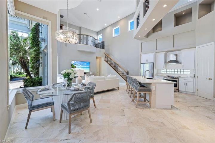 Doors and windows overlook the private pool/courtyard area.