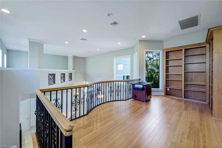 Loft/office space on upper level overlooking family room.