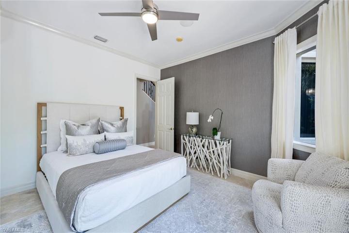 Guest bedroom on lower level tucked privately away from the primary bedroom.