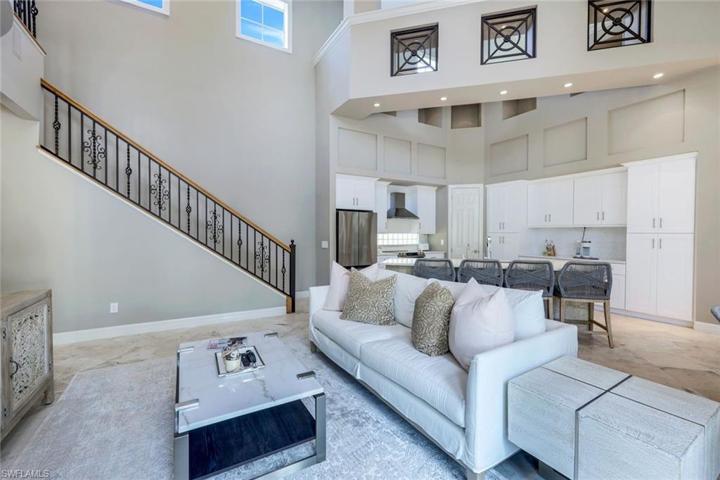 Gorgeous staircase leading up to open loft area and bedroom with en suite bathroom.