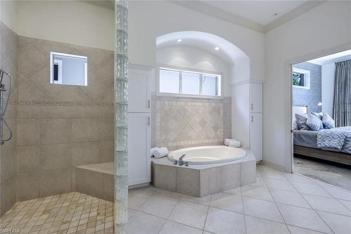 Primary bathroom with SO MUCH space. The soaking tub and shower are both oversized.