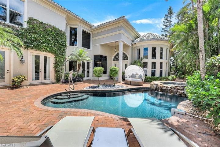 This courtyard style home is an absolute CHARMER!