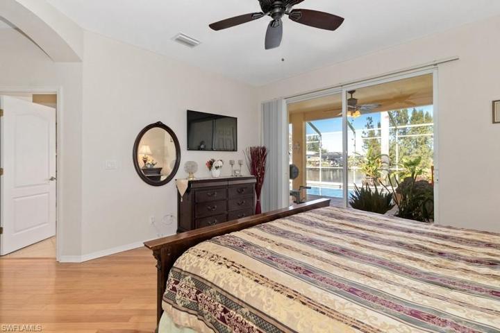 Master Bedroom has door wall leading to the pool deck and spa.
