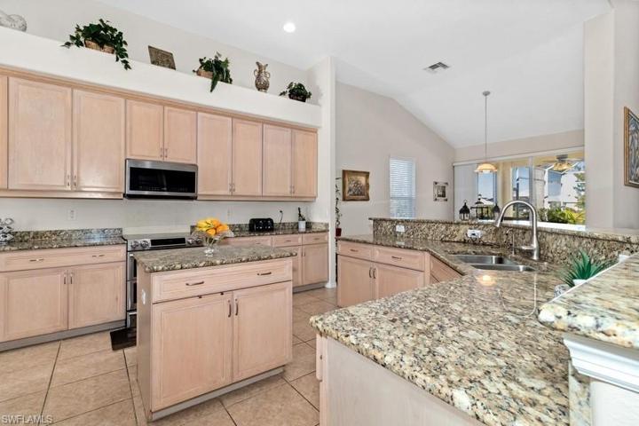 Granite and plenty of cabinet and counter space.