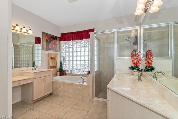 Impressive master bathroom with twin sinks, large shower and great soaking tub.