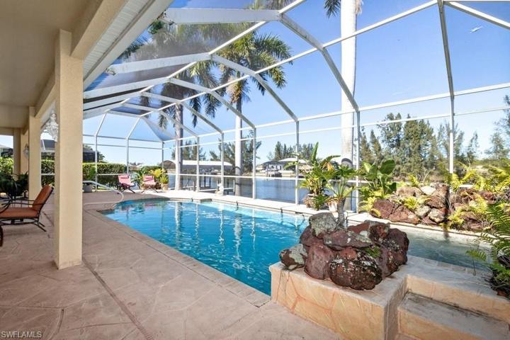 Fully caged pool, spa, and sun deck.