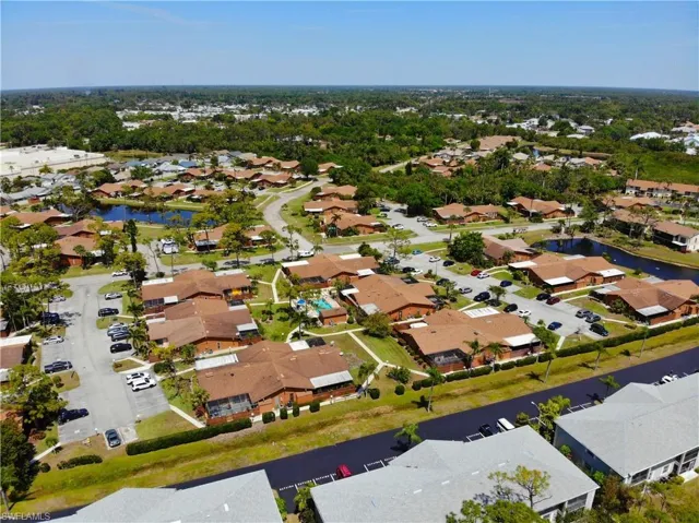 Bird's eye view with a residential view and a water view