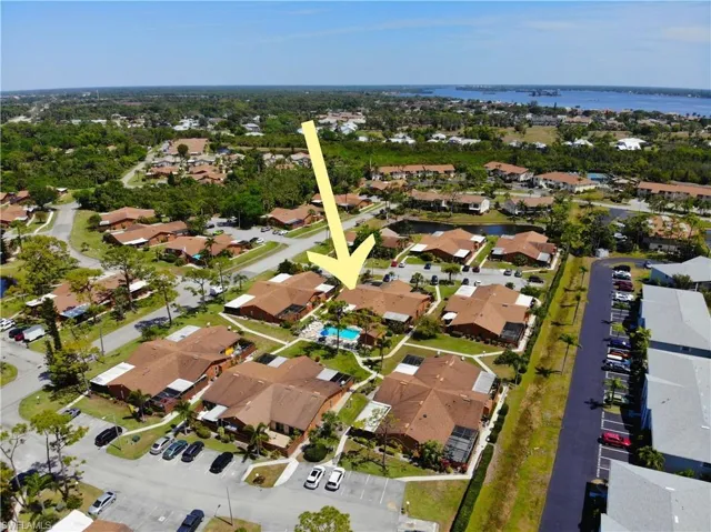 Drone / aerial view featuring a residential view and a water view