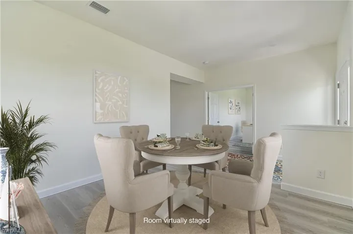 Dining room featuring light wood finished floors