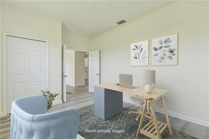 Office featuring wood finished floors