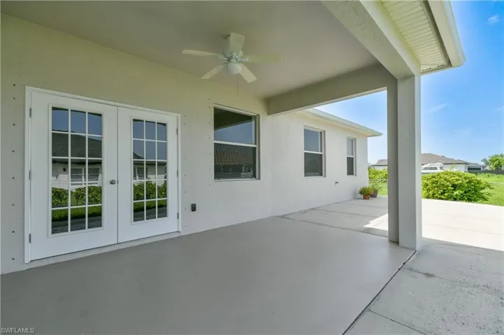 View of patio / terrace with ceiling fan and french doors