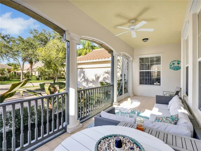Wooden deck featuring a ceiling fan and outdoor lounge area
