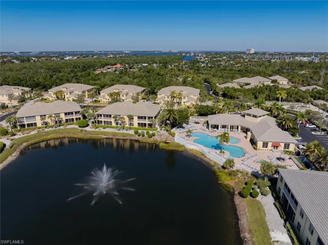 View of property location featuring 1st pool area and a large body of water