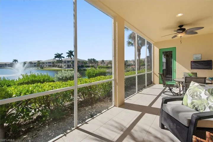 Sunroom featuring tile patterned floors, a water view, ceiling fan, floor to ceiling windows, and recessed lighting
