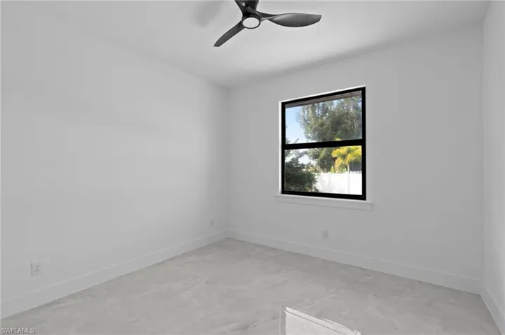 Unfurnished room with ceiling fan