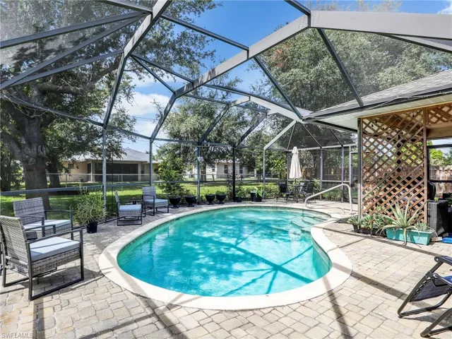 View of pool and a patio