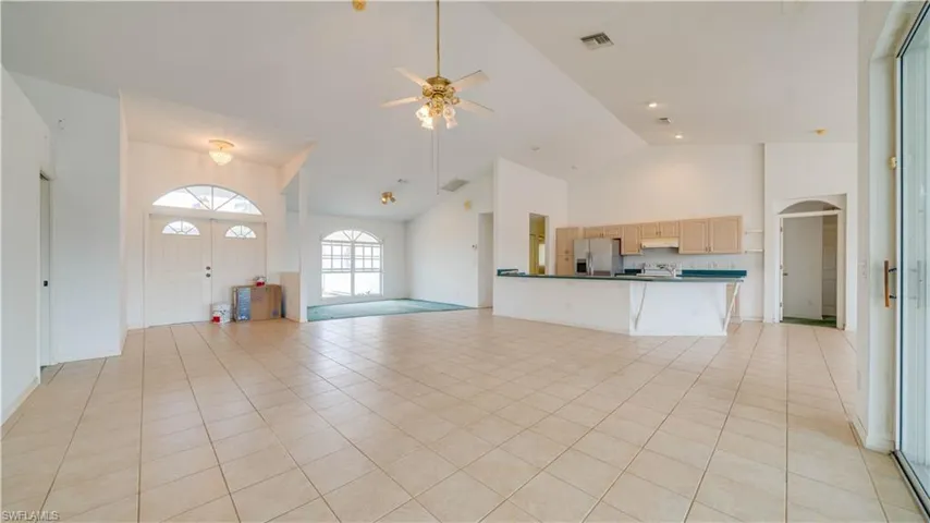 View of Great Room from sliding doors showing dining area which could also be used for a den, office, play area, etc.