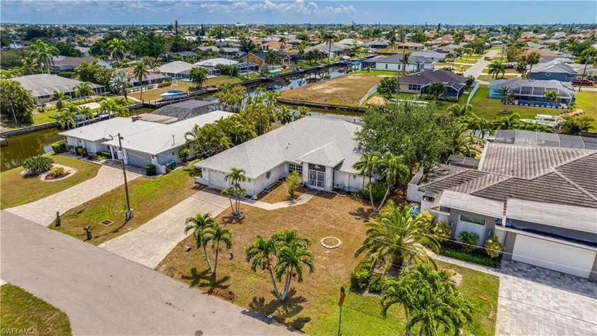 Aerial view with a residential view and a water view