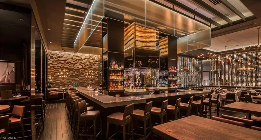 Wine cellar with a high ceiling and indoor bar
