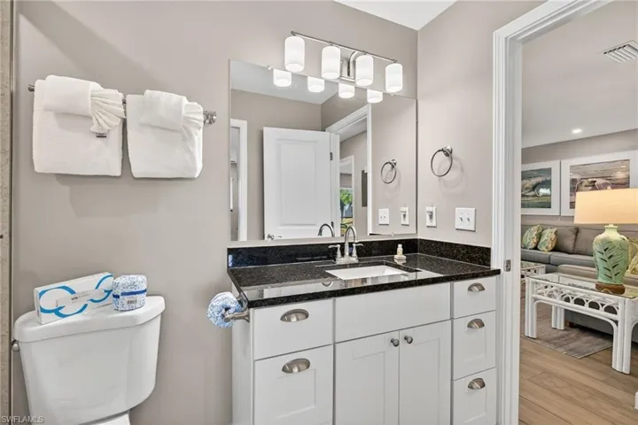 Bathroom featuring vanity and light wood-style flooring