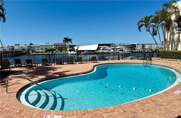 Community pool overlooking Naples Bay