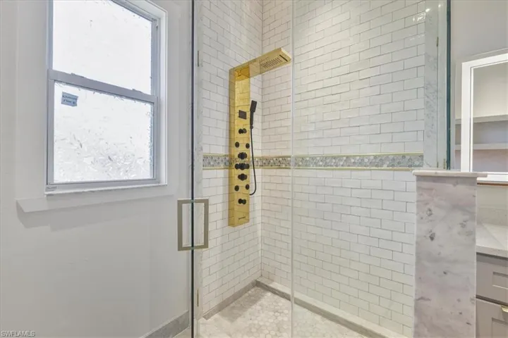 Bathroom with a stall shower