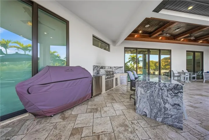 View of patio with an outdoor kitchen / dining area