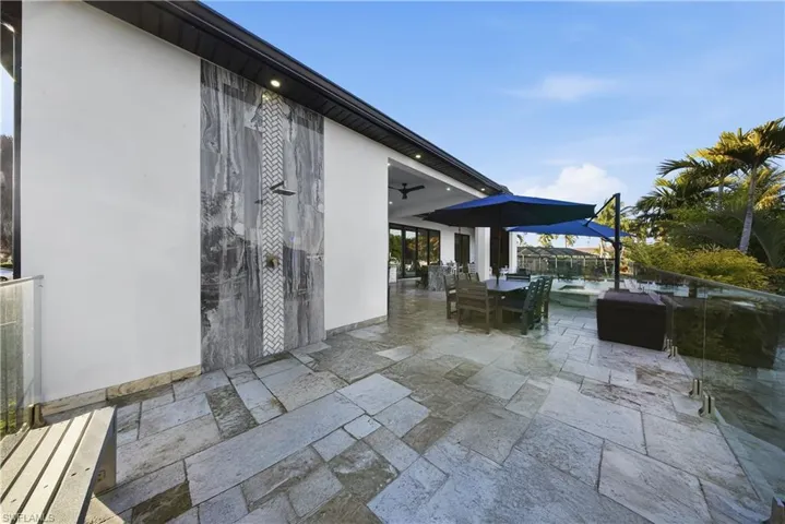 View of patio / terrace with outdoor dining space and a ceiling fan