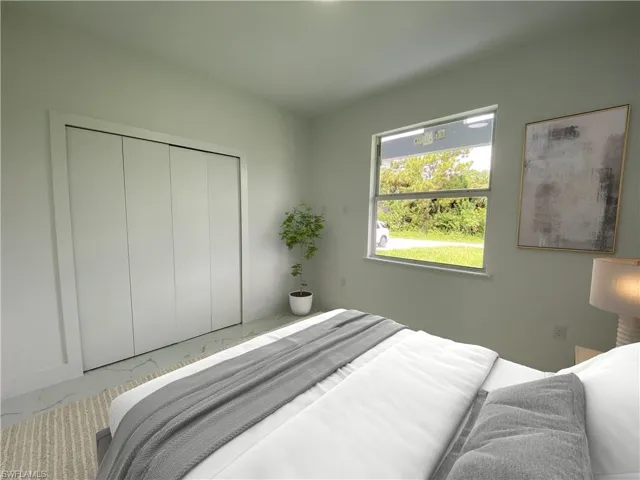 Virtually staged Bedroom with a closet