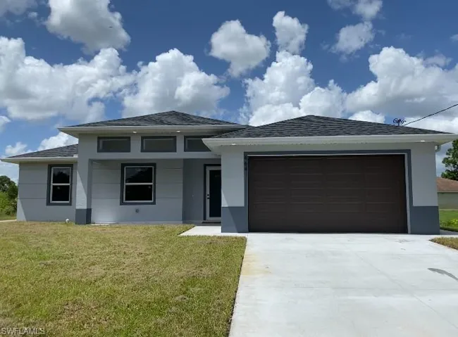 Prairie-style house featuring a front yard