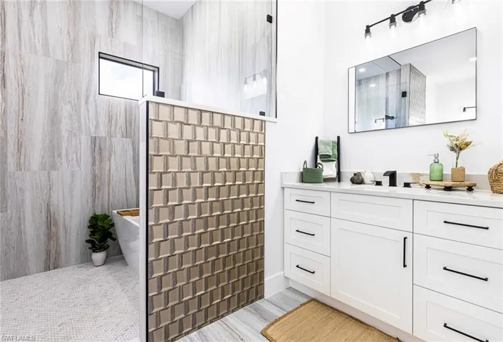 Primary has 2 separate vanity areas.