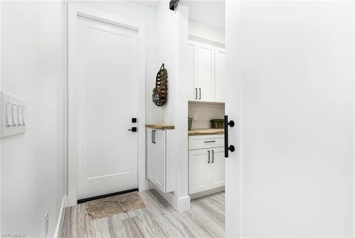 The drop zone. Keep your keys organized and store the mail. You can even keep your shoes under the floating shelf.