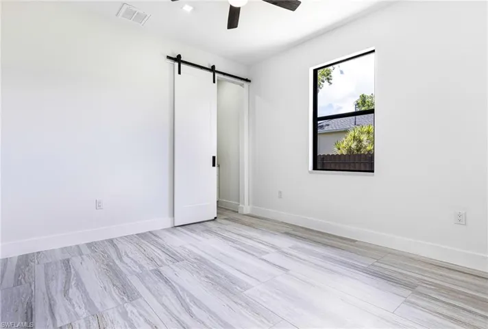 Large and bright with recessed lights and pre-wired for TV and Cable,
