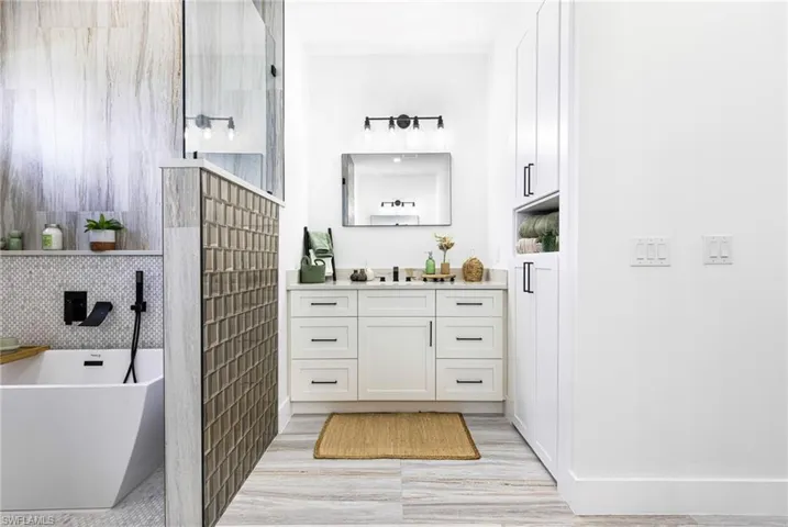 Her vanity area with custom built in for all the necessary items and to store some linens.