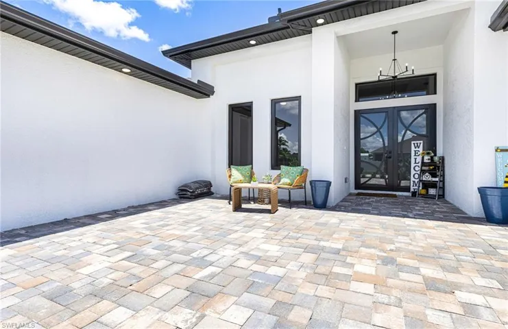 Front entryway is large with added exterior living space. Get that imagination going!