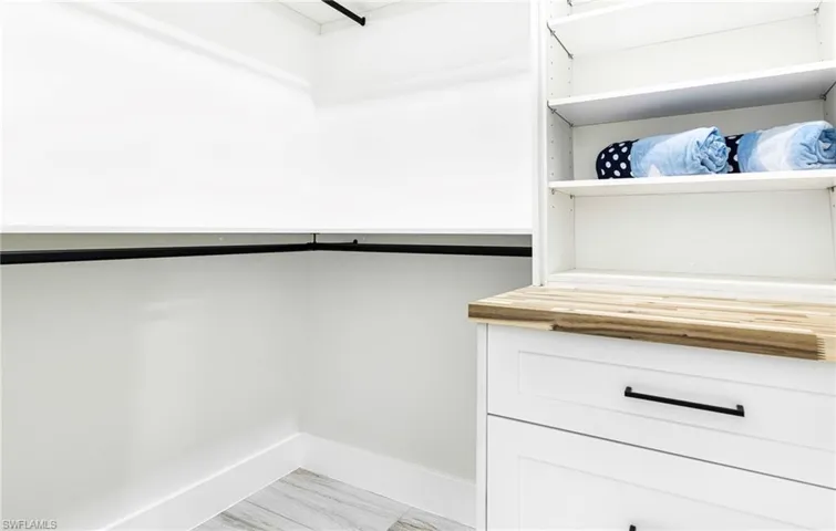 His closet is just right with a separate shoe rack and a place to keep his treasures.