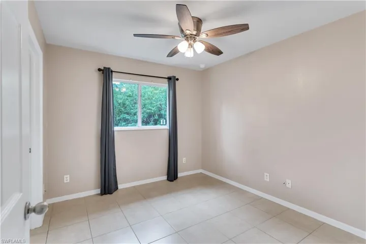 Unfurnished room with ceiling fan