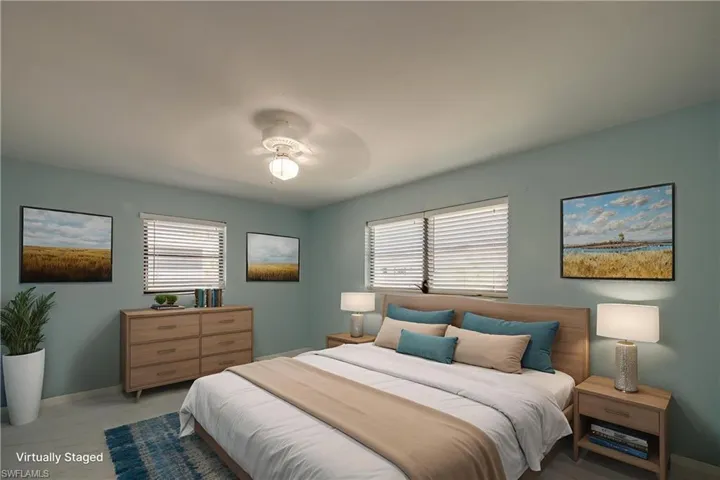 Bedroom with baseboards and ceiling fan