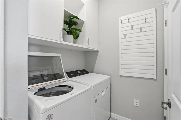 Laundry with custom cabinets