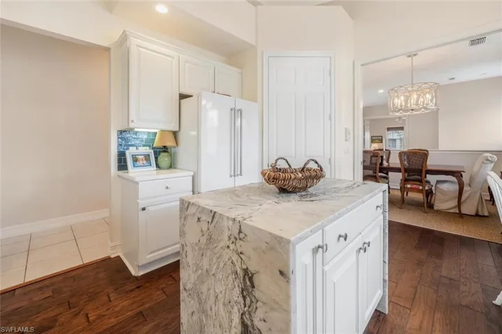 Extra Storage in the island with granite top and side for a work of art