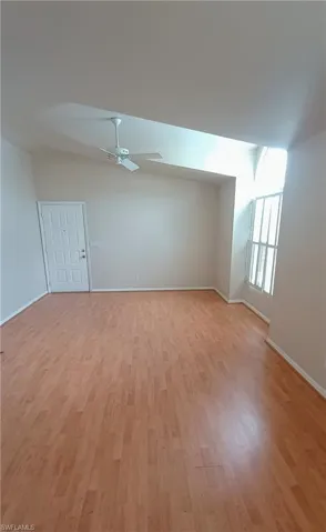 Unfurnished room with light wood-type flooring and ceiling fan