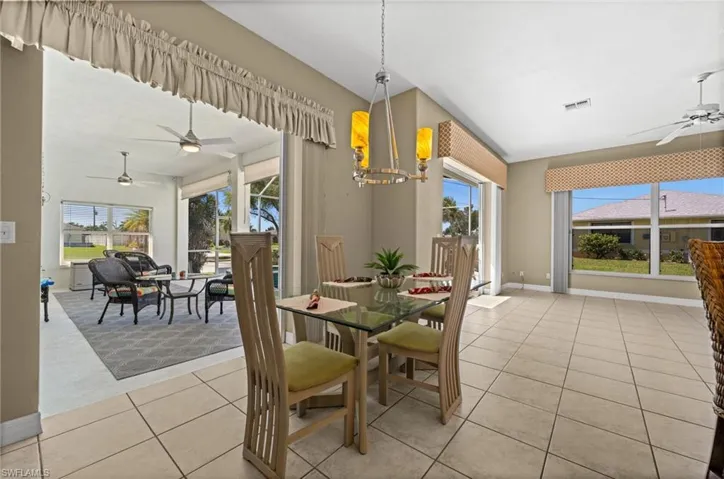 Let the fresh air in. This set of sliders is one of four with direct access to your outdoor oasis.