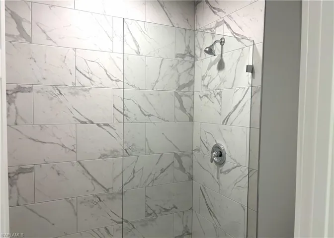 Bathroom view of a shower stall