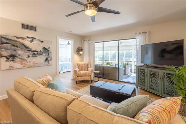 Living room featuring wood finished floors