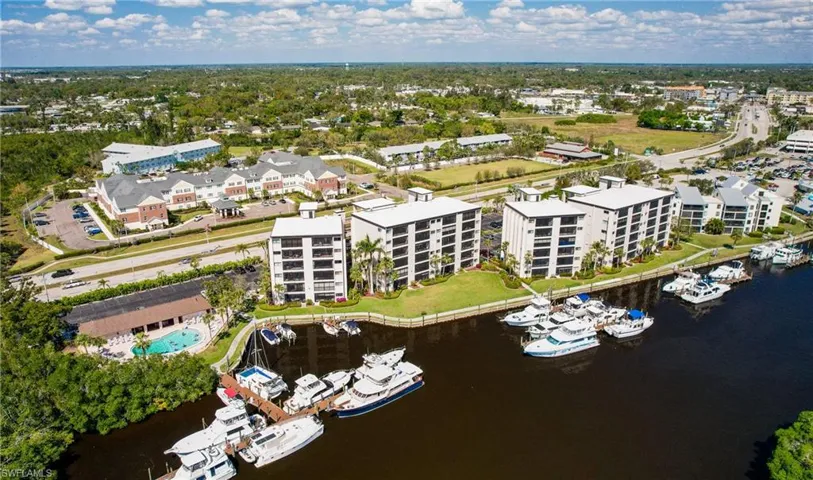 Bird's eye view of a marina and a nearby body of water