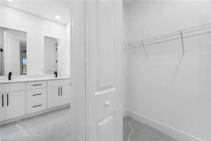 Walk in closet with sink