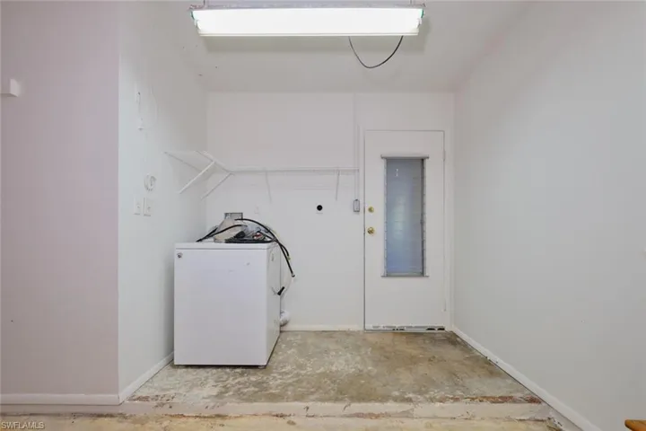 Laundry area featuring washer / dryer