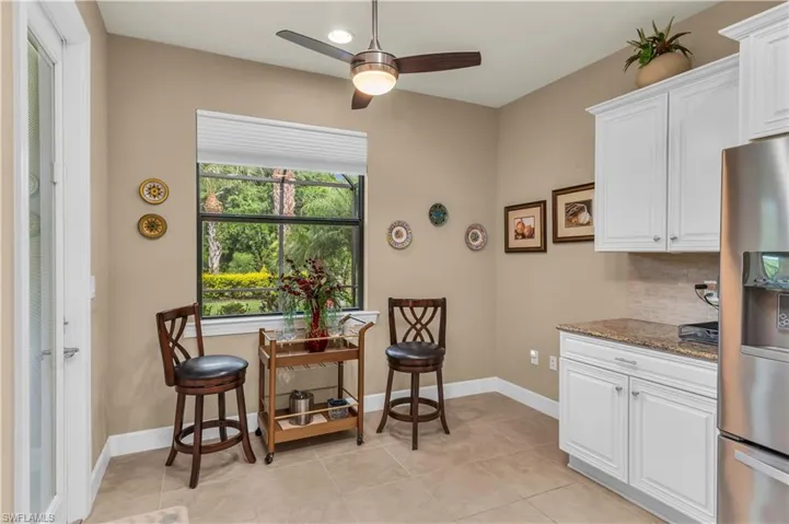 Breakfast Nook With Preserve Views And Door To Lanai
