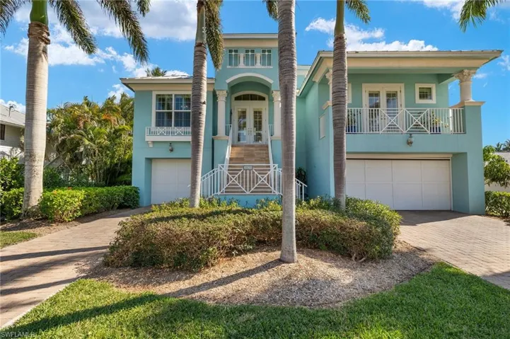 Front of home showing tandem 6-car garage