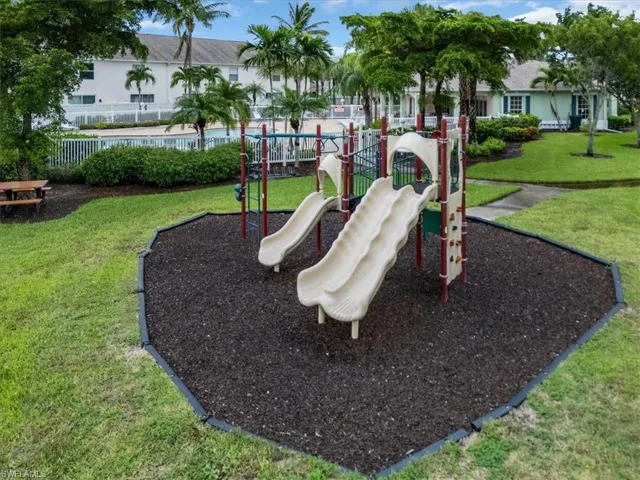 View of play area with a yard